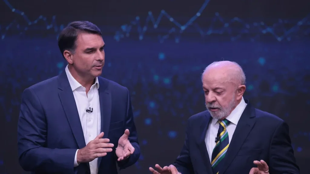 Debate Globo: Flávio Bolsonaro e Lula confrontam-se sobre Banco Central e políticas sociais Debate Globo: Flávio Bolsonaro e Lula confrontam-se sobre Banco Central e políticas sociais