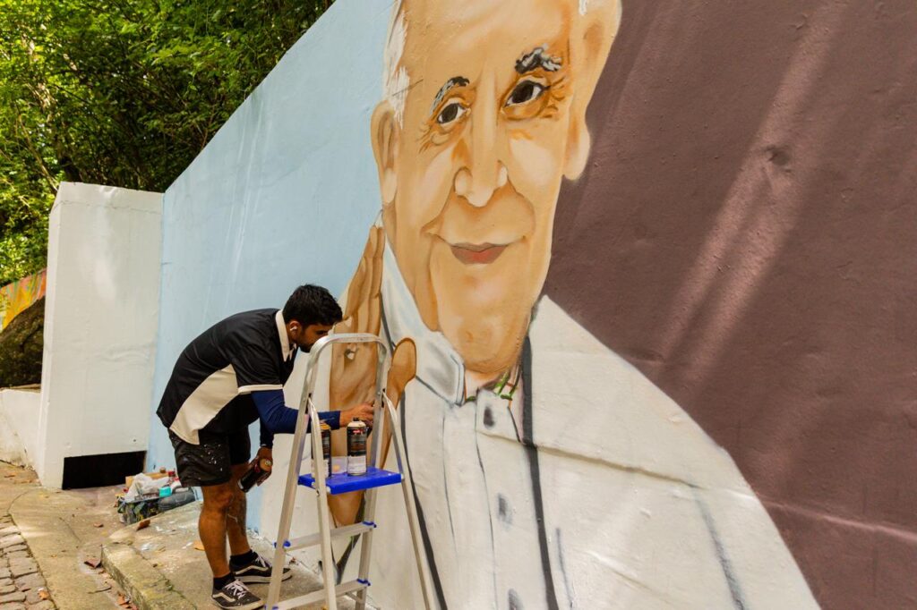 Quatro Artistas Transformam Subida ao Convento em Exposição de Grafite e Fé na Festa da Penha 2026