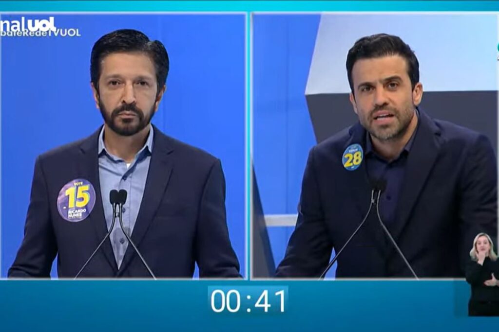 “Marçal ataca Nunes e Datena enquanto pede desculpas a Tabata durante debate”